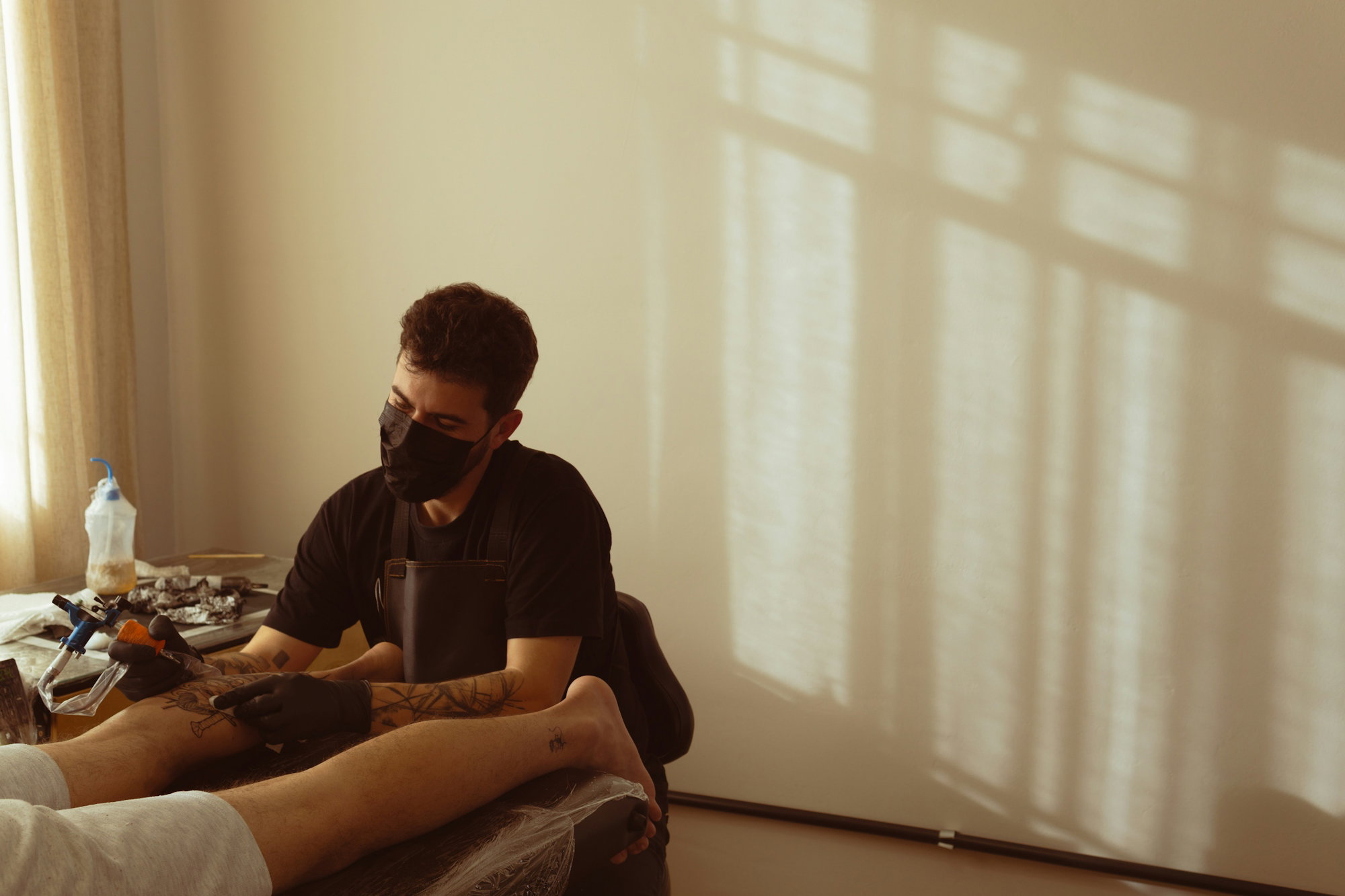 a-person-sitting-on-a-bed.jpg a person sitting on a bed
